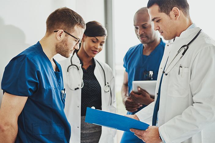Team of healthcare providers reviewing a case together
